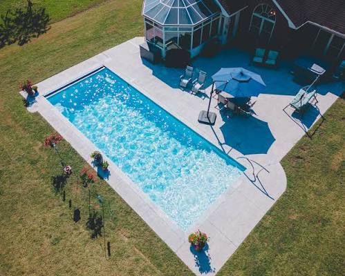 A picture of a blue pool. Sometimes copper in pools makes them look bluer. So trying to illustrate that
